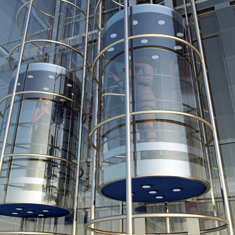 Glass panoramic lifts with stainless steel frames